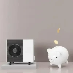 tirelire en cochon près d'une pompe à chaleur pour symboliser les économies d'énergie
